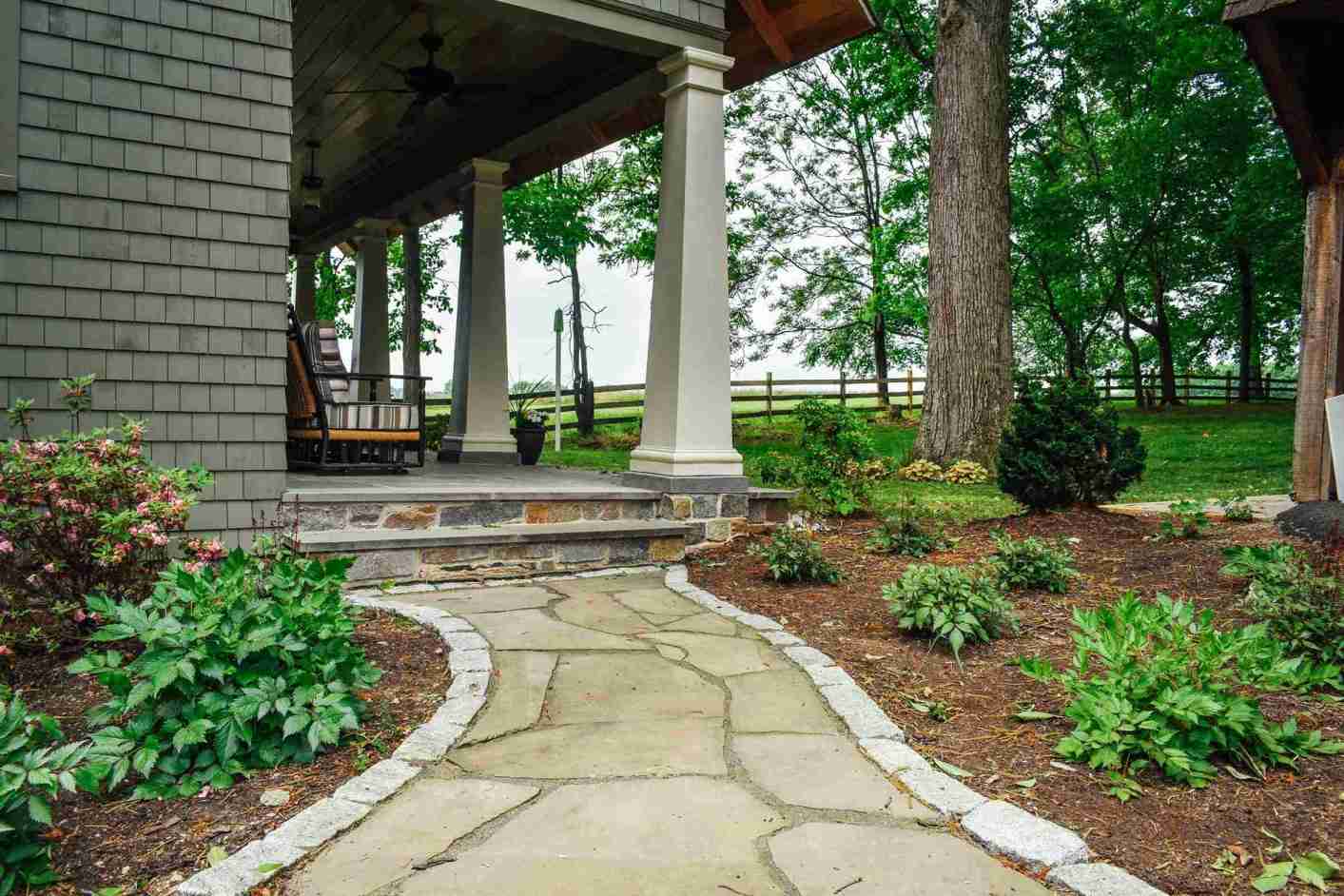 Flagstone path with stone steps and river rock