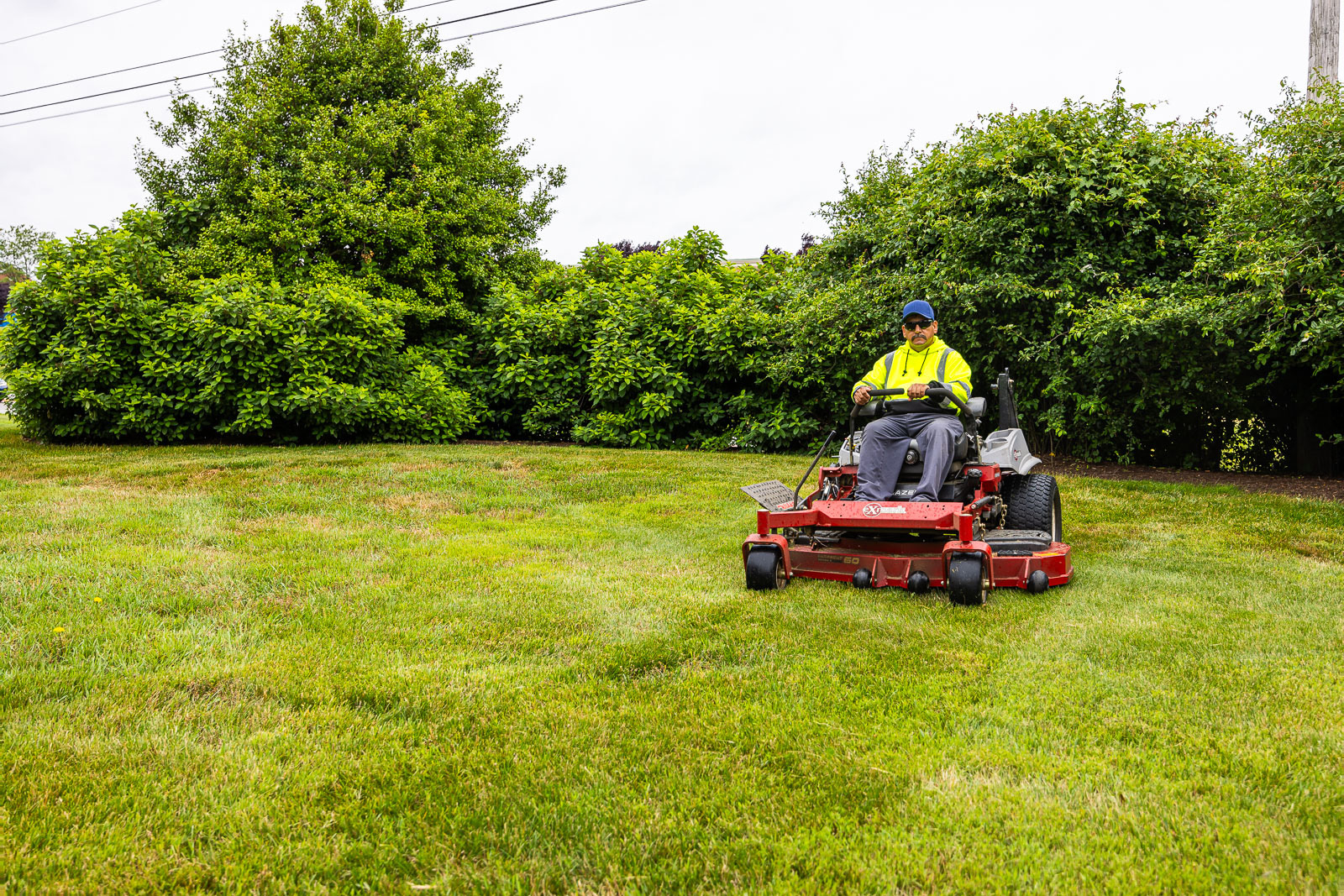 Zero-turn mower on a commercial lawn in Chester County