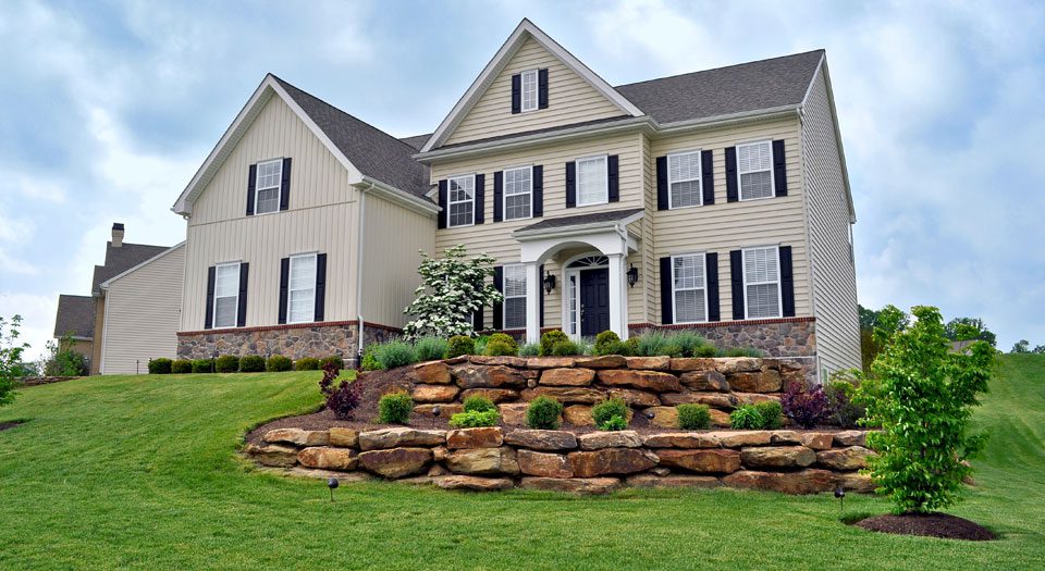Retaining wall managing water flow on a Southeastern PA home