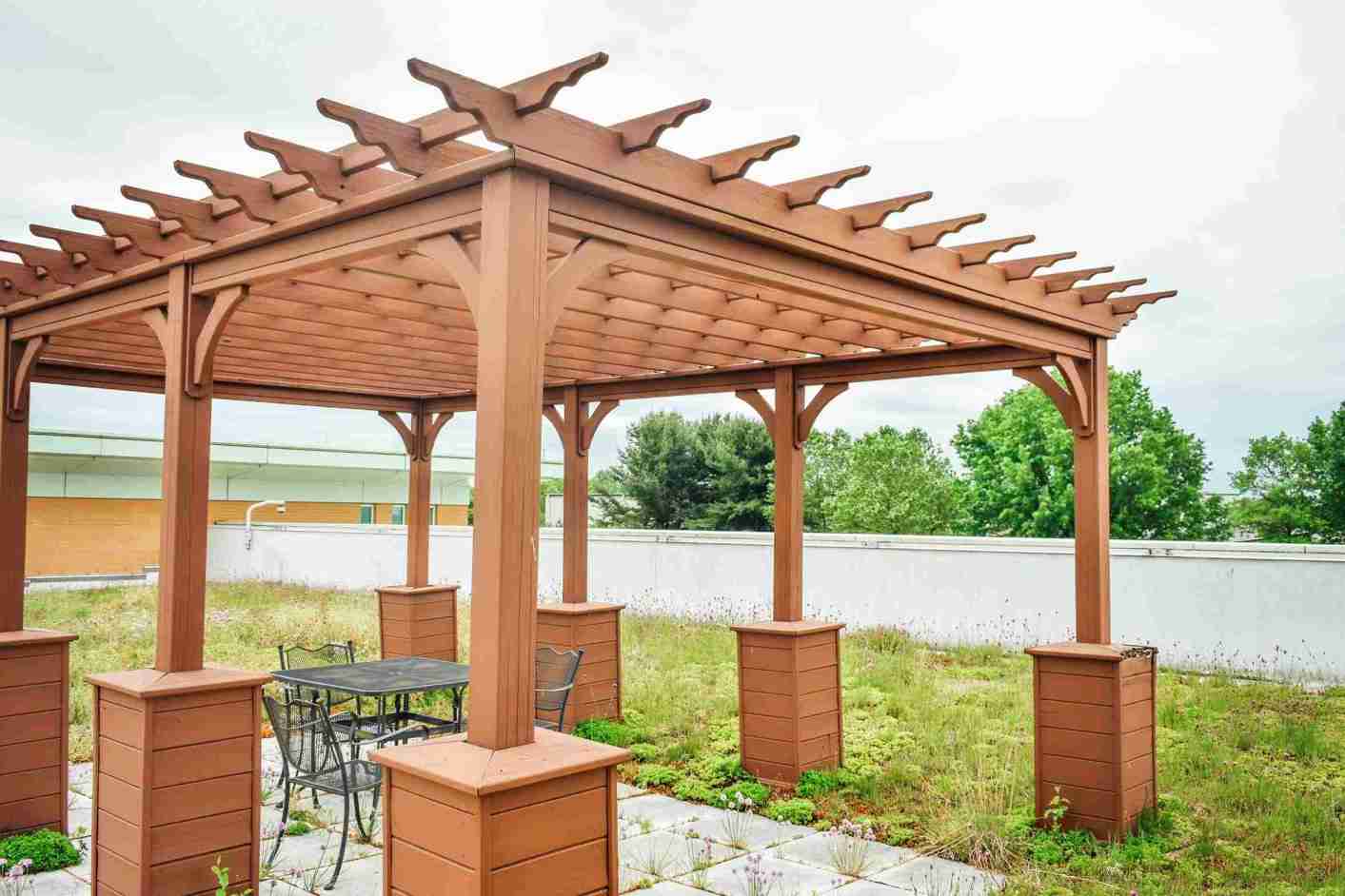 Timber pergola dining area — summer landscaping in Landenberg